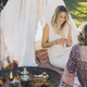 The “simple white canvas children’s tee-pee” Lauren enlarged and covered with vintage lace blankets for her post-wedding Moroccan-themed brunch.